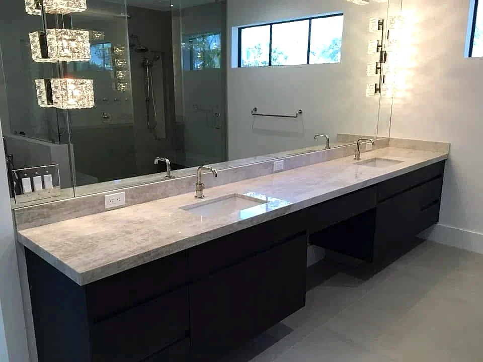 Double vanity with two faucets and undermount sinks installed, South Florida