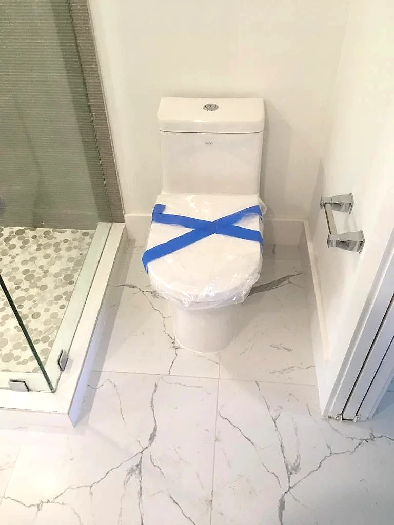 New one-piece toilet installed in a renovated bathroom, South Florida